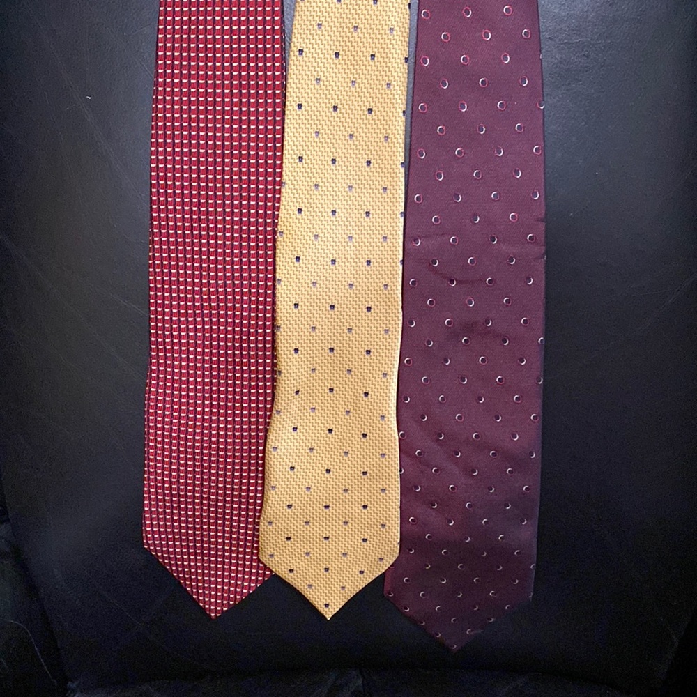 Three mens nautical neckties that are silk